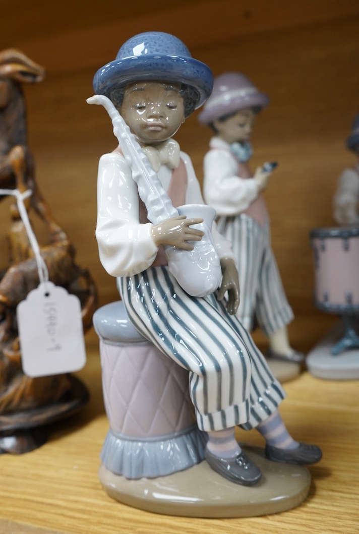 A Lladro group of six ‘Jazz Band’ figures, tallest 25cm. Condition - good